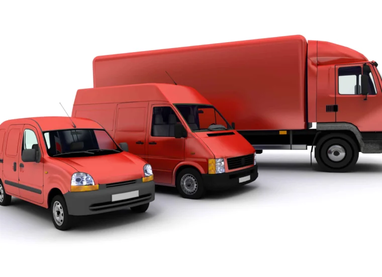 Three red delivery vehicles—a small van, a medium van, and a large truck—parked side by side on a white background, showcasing options available through our Fleet Program.