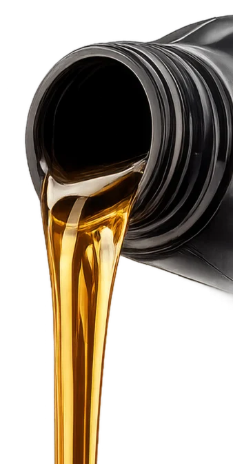 Golden motor oil is being poured from a black plastic container against a white background.